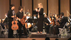 12 year-old Kevin Huang and 14 year-old Chris Monteverde acknowledging the applause by Executive Director and Conductor of The South Florida Youth Symphony Orchestra, Marjorie Hahn, at the close of a performance at Florida Memorial University.